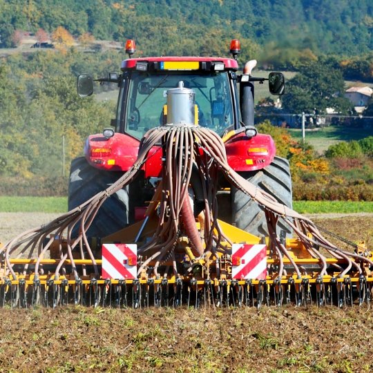 aerial-drone-view-harvester-gathering-crops